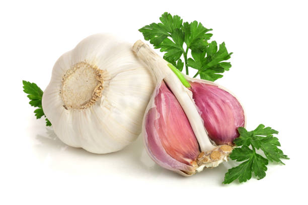 istock garlic with parsley leaf isolated on white background 930864428