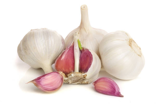 istock garlic isolated on white background close up 930864490