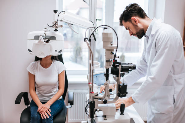 istock Doctor and patient in ophthalmology clinic 930864712