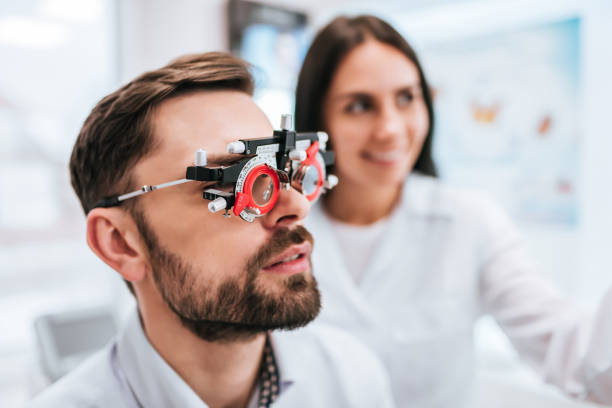 istock Doctor and patient in ophthalmology clinic 930864976