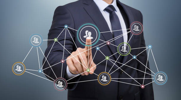 istock A hand touching a screen with social network icons 930865696
