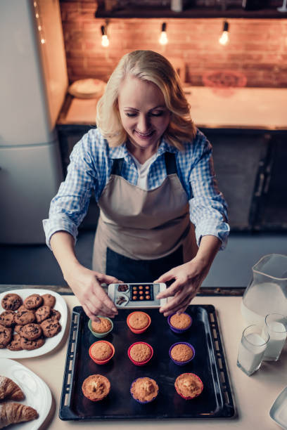 istock Senior woman cooking on kitchen 930868008