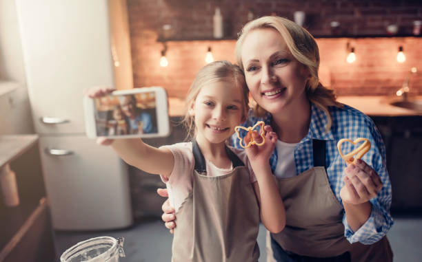 istock Grandmother and granddaughter cooking on kitchen 930868644