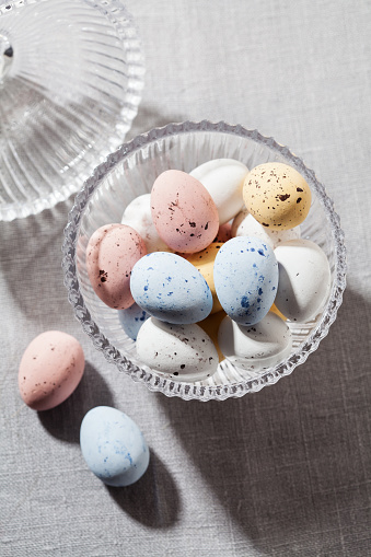 Chocolate speckled Easter eggs in crisp sugar shell. Easter concept