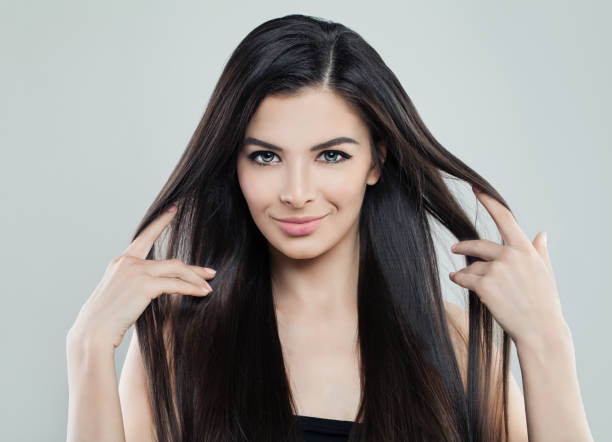 Pretty Young Model Woman With Long Silky Hair And Natural Makeup Hair Care  Concept Stock Photo - Download Image Now - iStock