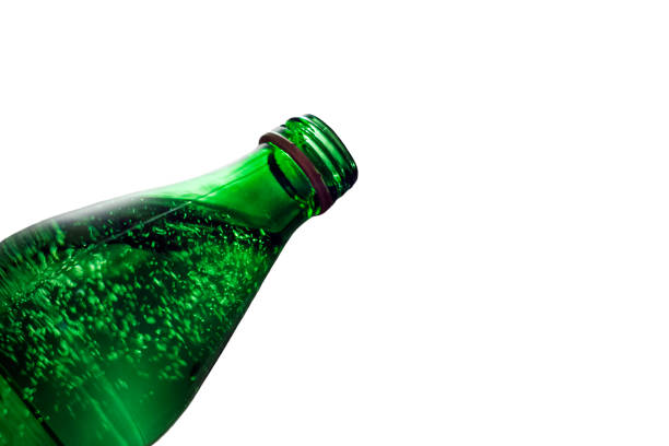 istock Green bottle with mineral water isolated on white background 930875608
