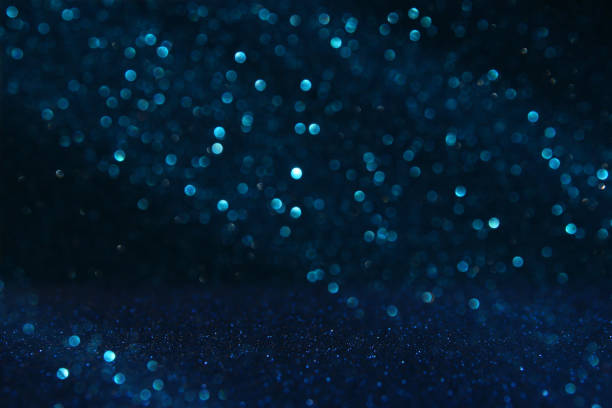 istock glitter vintage lights background. purple, blue and pink. de focused. 930879598