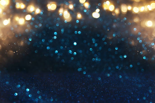 istock glitter vintage lights background. purple, blue and pink. de focused. 930879618