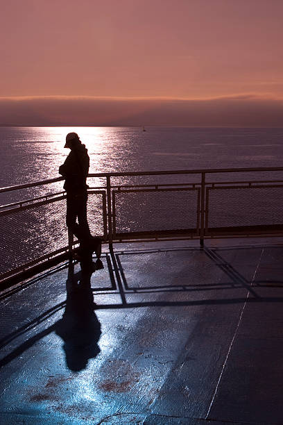 contemplação no convés de um navio. - men railing passenger ship shipping imagens e fotografias de stock