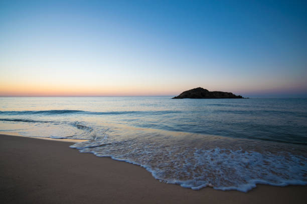 istock Su Giudeu island at sunrise, Chia, Sardinia. 930884352