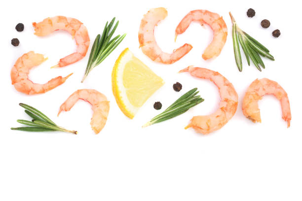 istock Red cooked prawn or shrimp with rosemary and lemon isolated on white background with copy space for your text. Top view 930884730