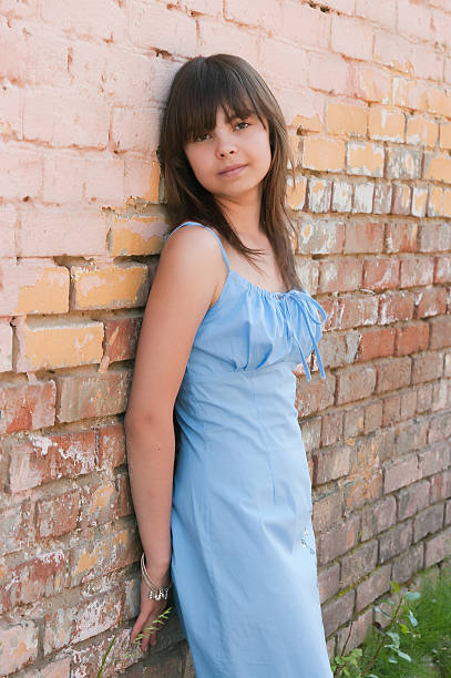 istock The girl at a brick wall 93088722
