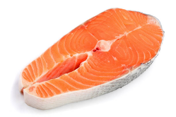 istock Slice of red fish salmon isolated on white background 930889642