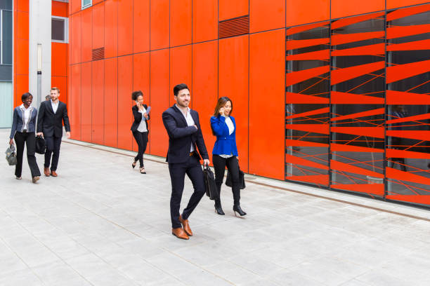 istock Business people walking on a street 930892934