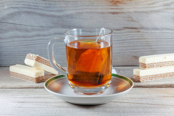 istock Mug of tea with waffles 930896696