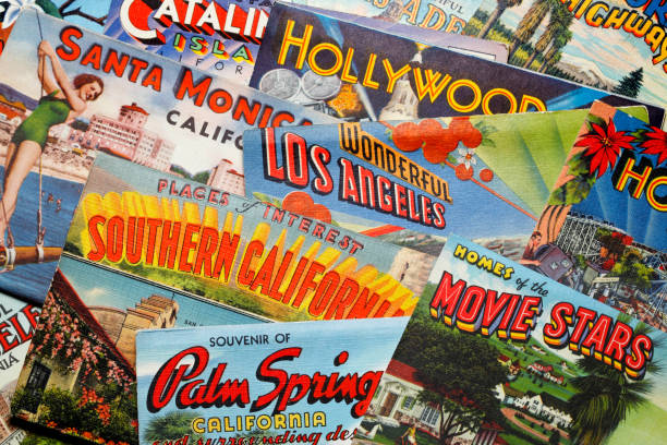 Vintage Postcards From Los Angeles Area San Diego, CA, USA - February 27, 2018: A close up of several vintage postcards from the 1930's, 1940's and 1950's representing various cities and areas in the greater Los Angeles area rest randomly on top of each other in a studio setting. Cities and areas represented include Catalina Island, Los Angeles,Santa Monica, Hollywood, Pasadena, and Palm Springs.  The postcards were a popular way for visitors and travelers to share their travel experiences with friends and family during the mid-20th century. hollywood california photos stock pictures, royalty-free photos & images