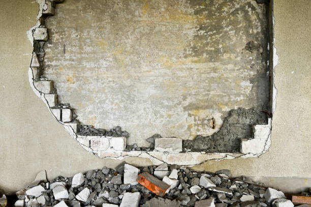 istock Partially destroyed wall inside an industrial building under demolition 930904968
