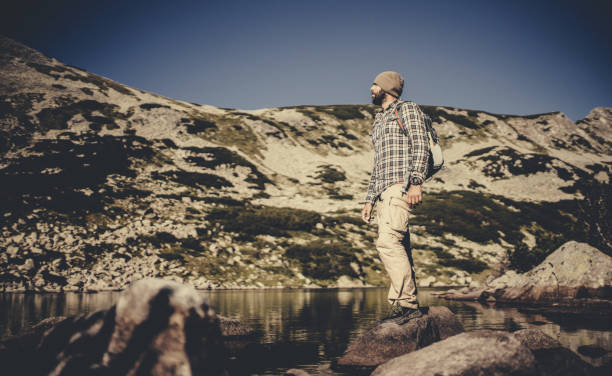 istock Hiking in the mountains alone 930907388
