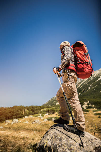 istock Hiking in the mountains alone 930909852