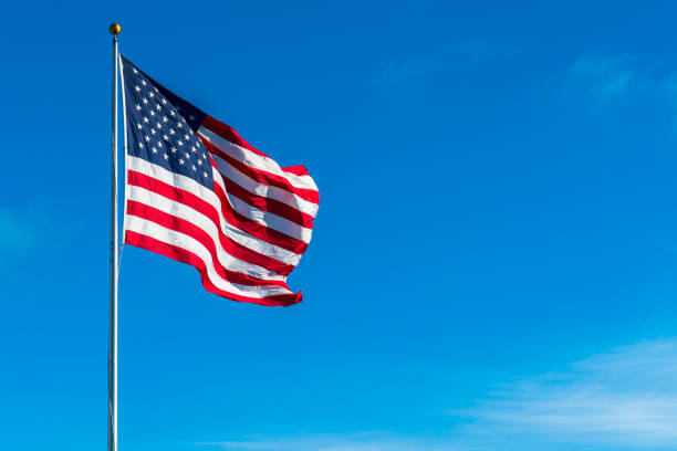 istock Perfect American Flag waving in the wind with shadows 930910724