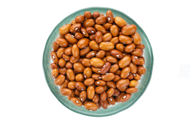 istock raw brown beans in a plate 930915774