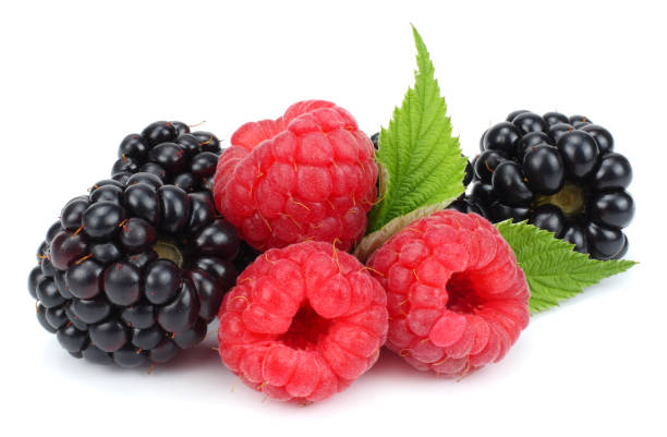 istock blackberries with raspberries and green leaf isolated on white background. macro 930930168