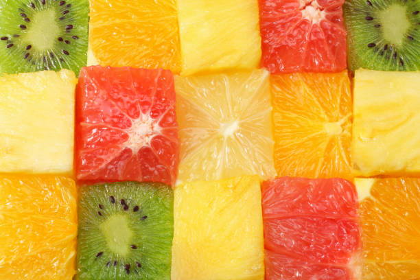 istock healthy citrus fruit salad background. top view 930930588