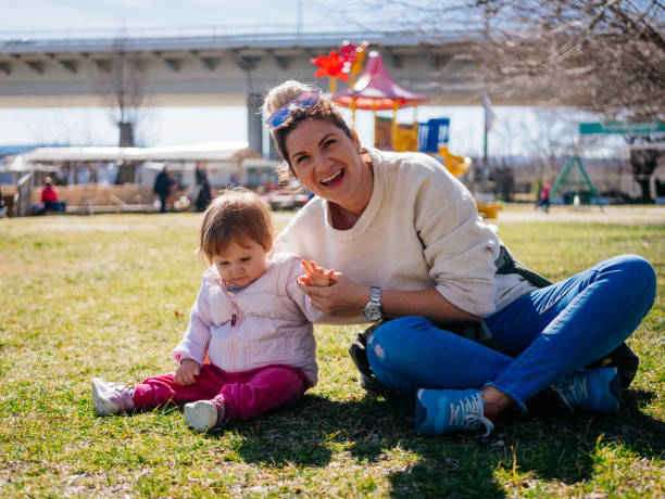 istock Parents with one year old baby in nature 930930890
