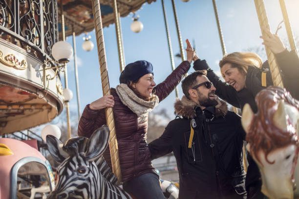 istock Friends having fun on Carousel at Paris 930933392