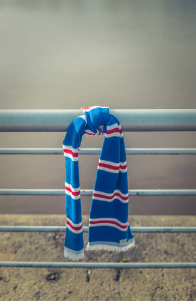 Football Club Scarf Football Club Scarf Tied To A Railing On A Match Day scotland football team stock pictures, royalty-free photos & images