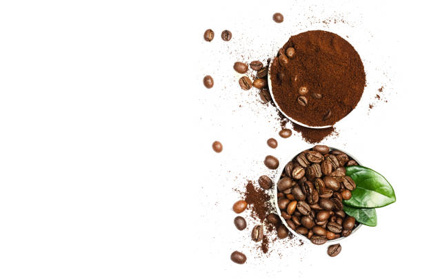 istock Shiny fresh roasted coffee beans with leaves isolated on white background with space for text 930943624