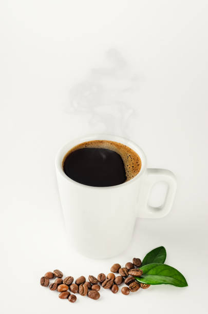 istock A cup of coffee with coffee beans on white background 930943716