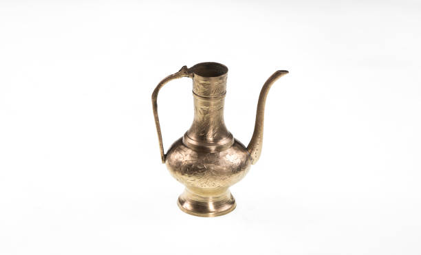 istock ancient Arabic silver teapot on white isolated background 930944336