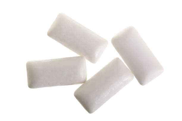 istock chewing or bubble gum isolated on white background. Top view 930944826