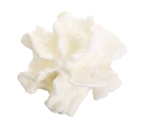 istock whipped cream or meringue isolated on white background. Top view. Flat lay 930947144