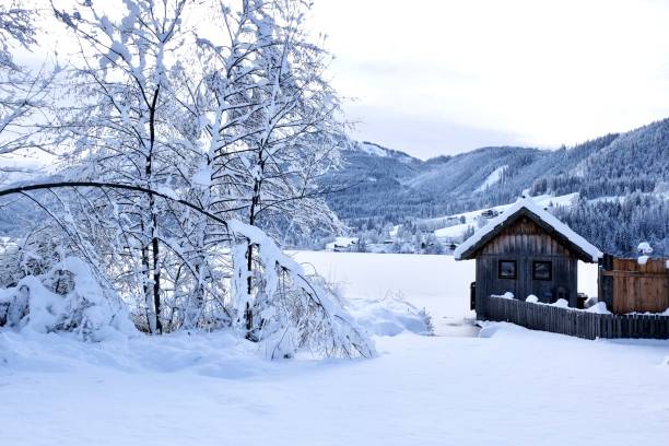 istock Houses On Snow Covered Landscape Against Sky 930950584