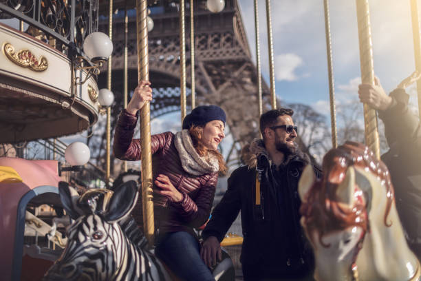 istock Friends having fun on Carousel at Paris 930952600