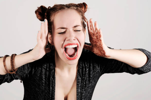 istock Young and funny hipster woman is shouting with hands up. 930955110