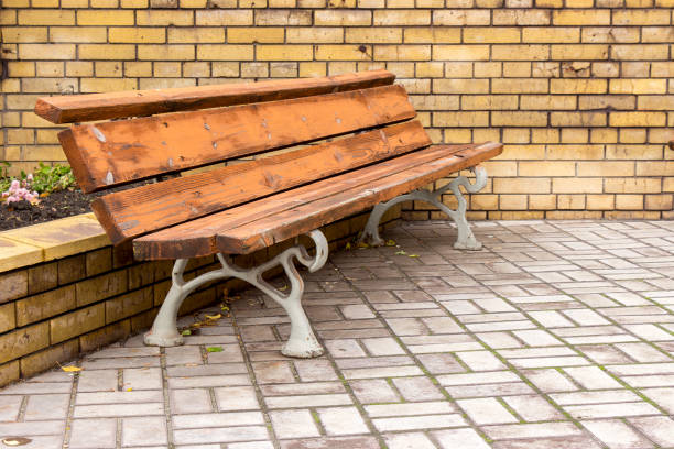 istock Wooden bench in the park 930956508