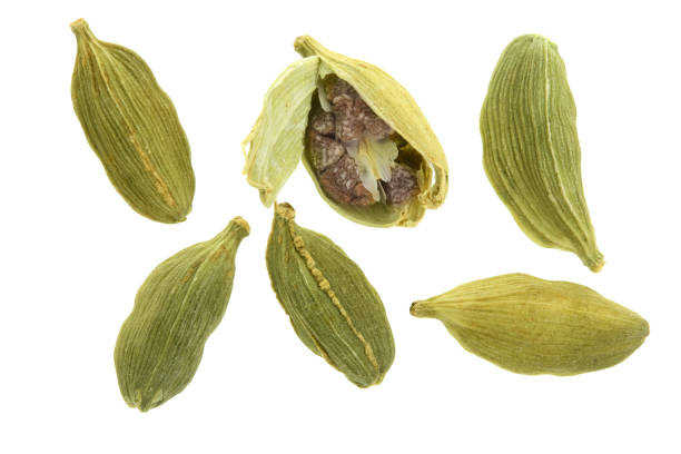 istock Green cardamom seeds isolated on white background. Top view. lay flat 930962156