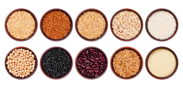 istock Healthy various cereals, grains and beans in the bowls, isolated 930968686