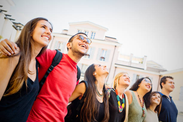 istock Group of real friendly college students in campus 930973104