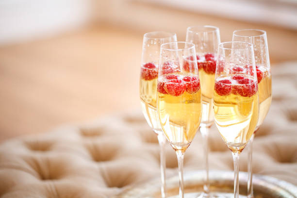 istock Champagne glasses on silver tray. Party concept 930978630