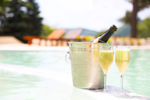 istock Champagne glasses and bottle in ice bucket 930985040