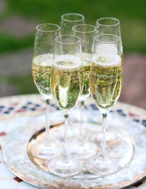 istock Champagne glasses on silver tray 930985106
