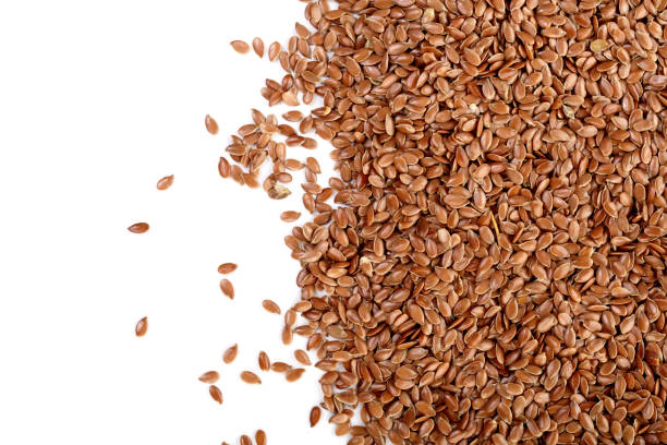 istock flax seeds isolated on white background with copy space for your text. Top view 930986066