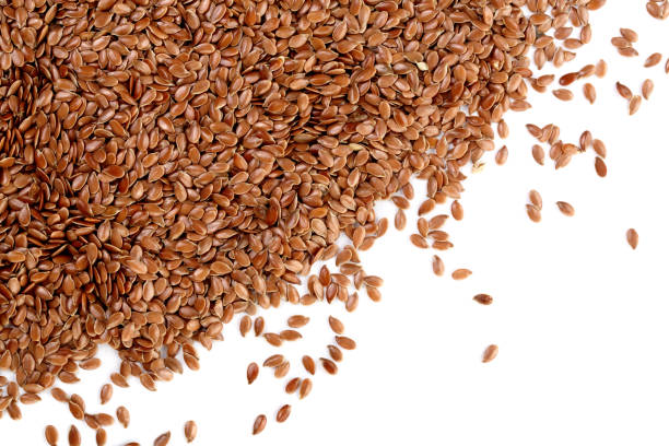 istock flax seeds isolated on white background with copy space for your text. Top view 930986132