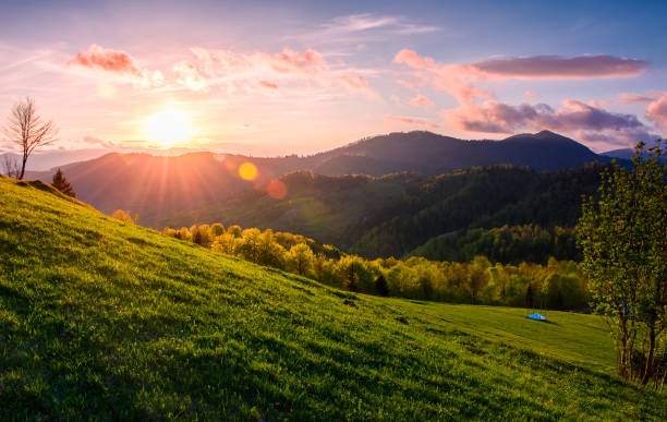 istock pink sunset over the mountains in springtime 931000126