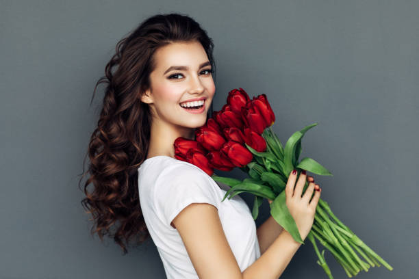 女性のためのロマンチックなバラ - floral dress ストックフォトと画像