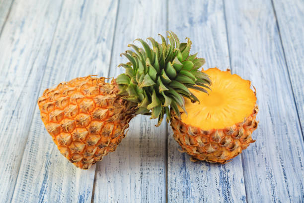 istock two halves of pineapple, cuted ripe pineapple 931015732